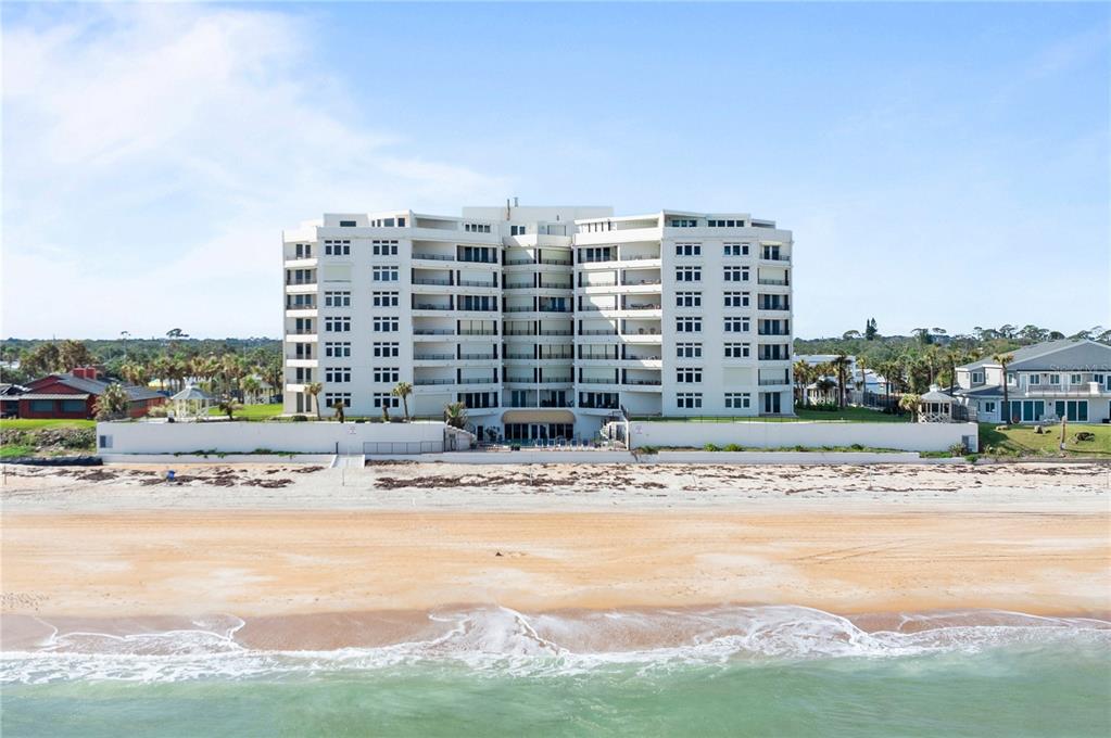 a view of building with ocean view