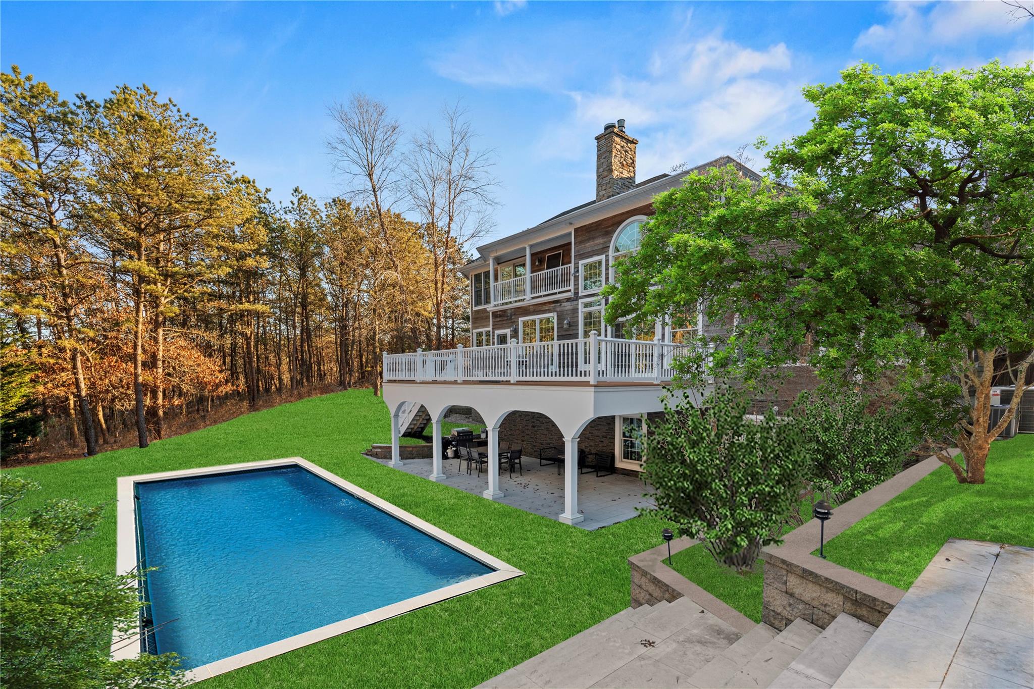 a view of an house with backyard space and garden