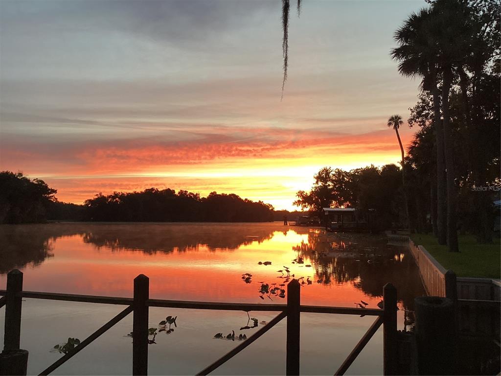 a view of a lake from a balcony