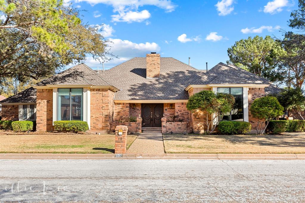 front view of a house with a patio