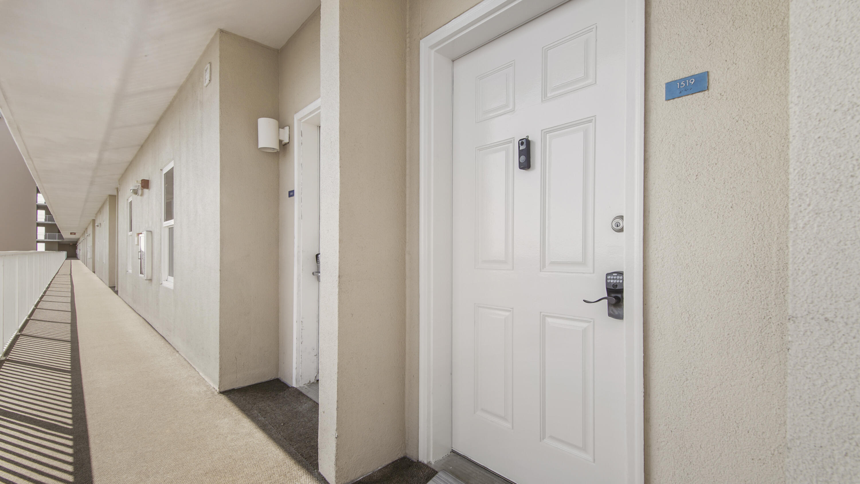 a view of a hallway with a white walls