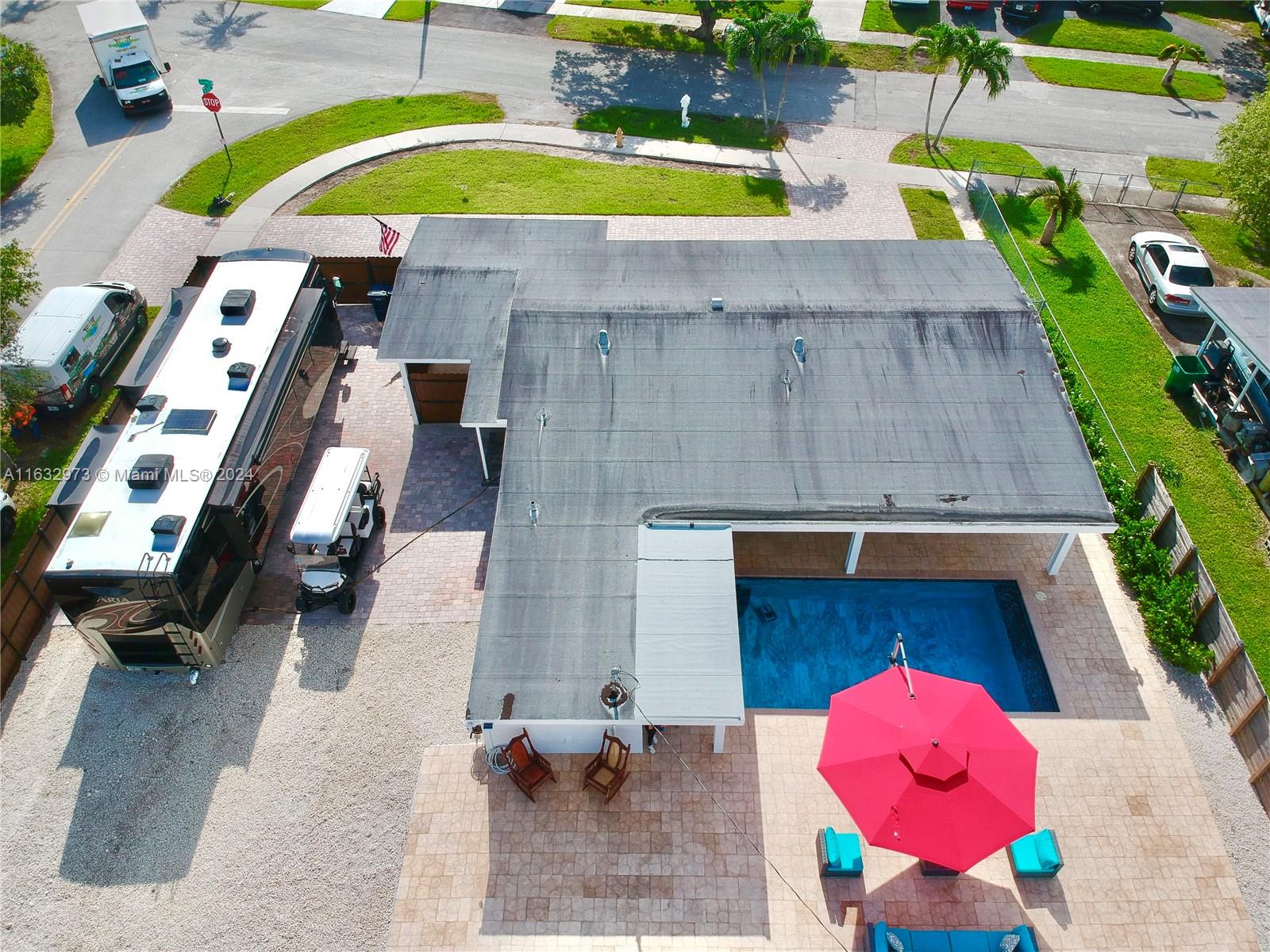 an aerial view of a fireplace with a swimming pool