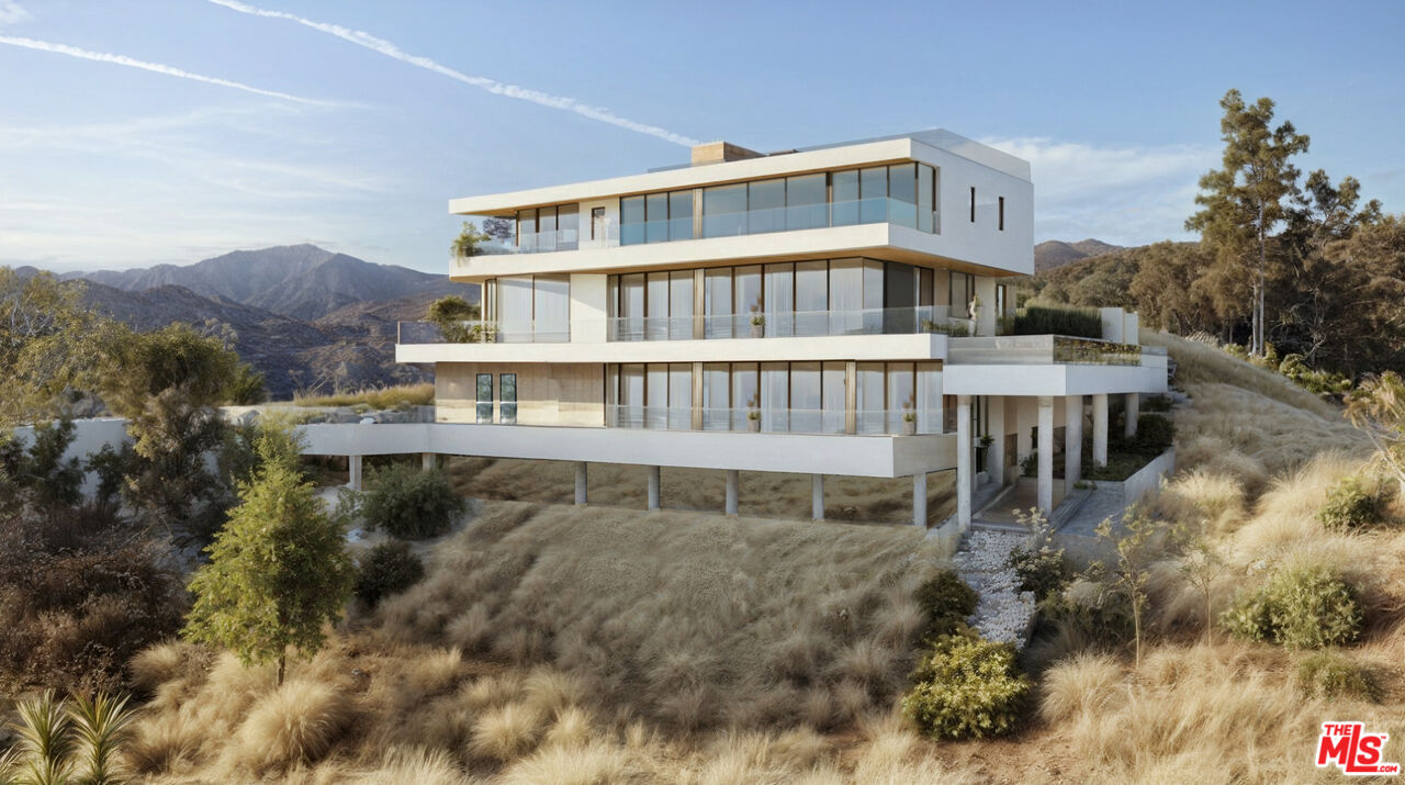 a view of a house with roof deck