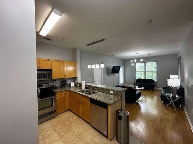 a kitchen with granite countertop lots of counter top space