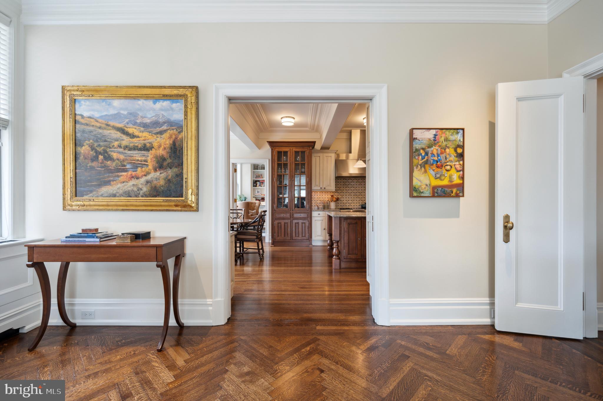 a view of a livingroom with furniture and wooden floor