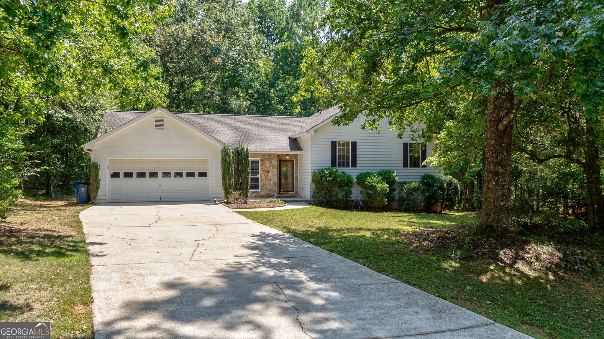 a house with yard in front of it