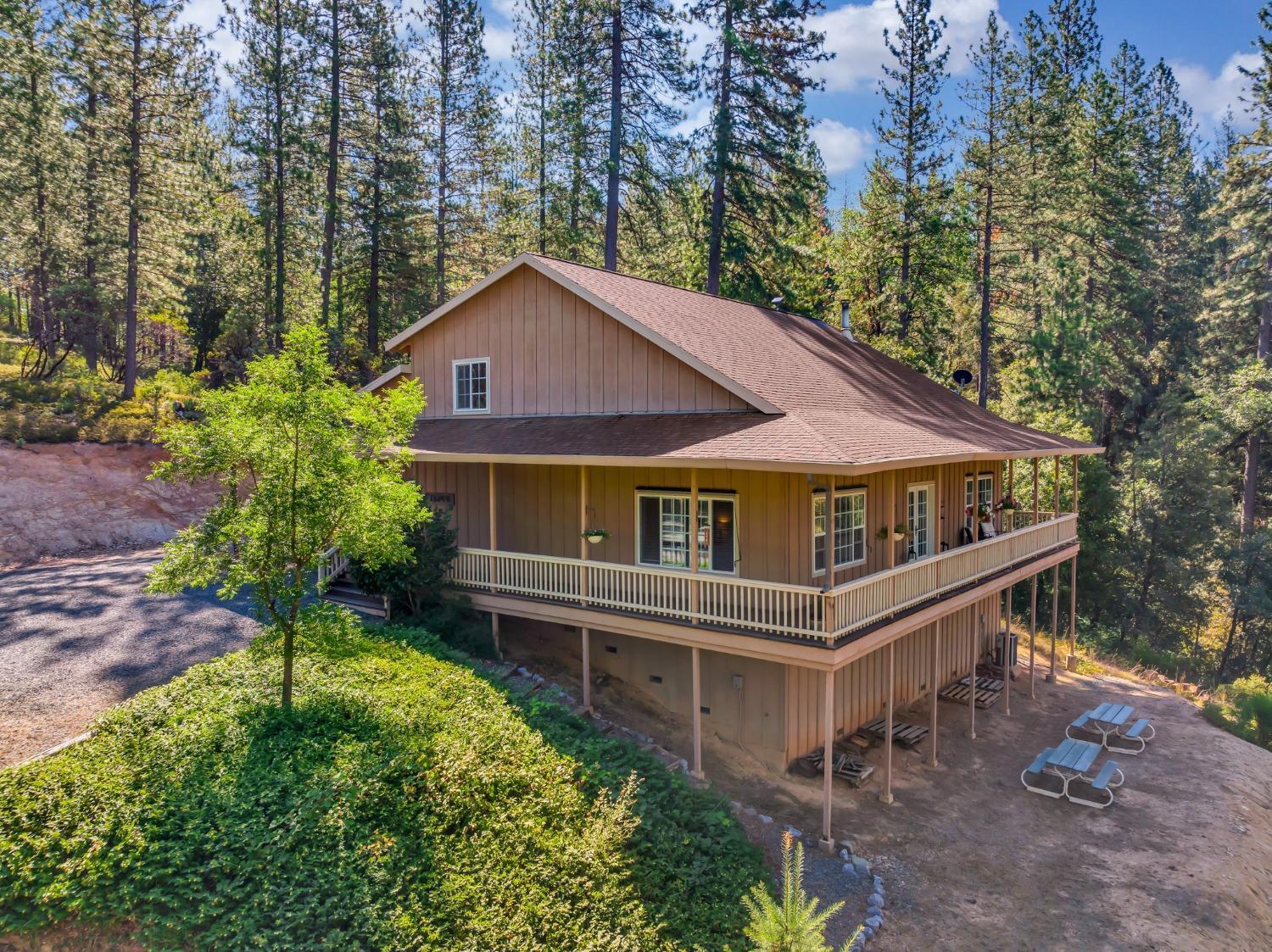 a house with trees in the background