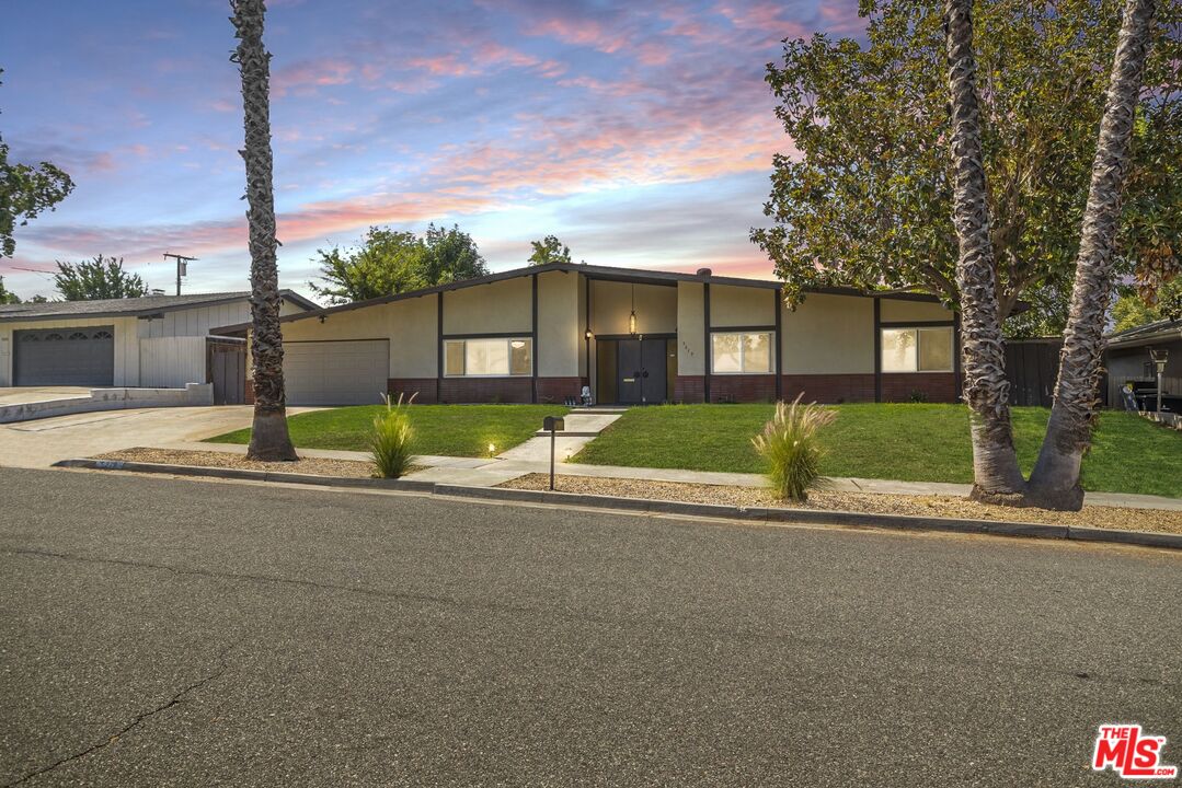 a view of a house with a patio