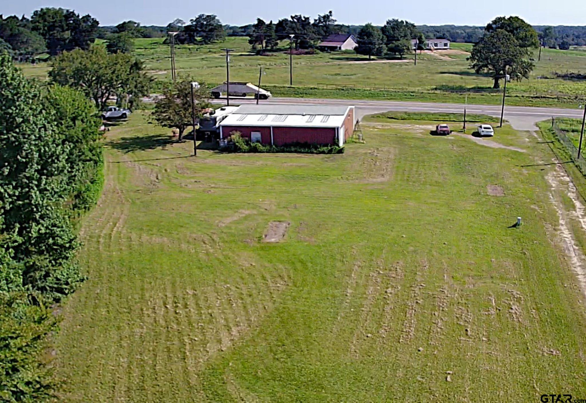 a view of a lake with a big yard