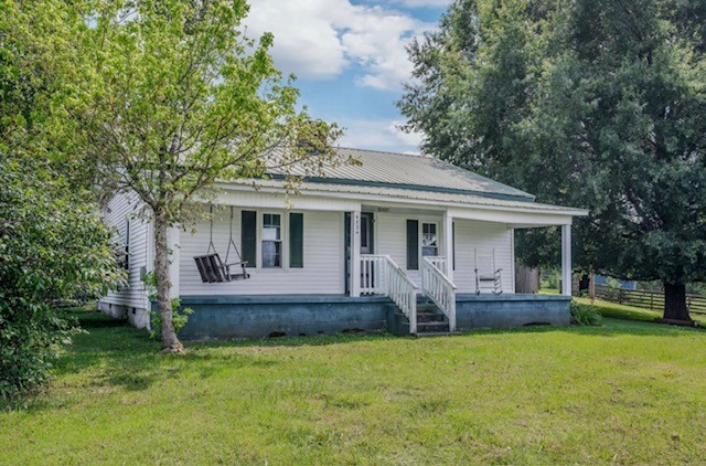 front view of house with a yard