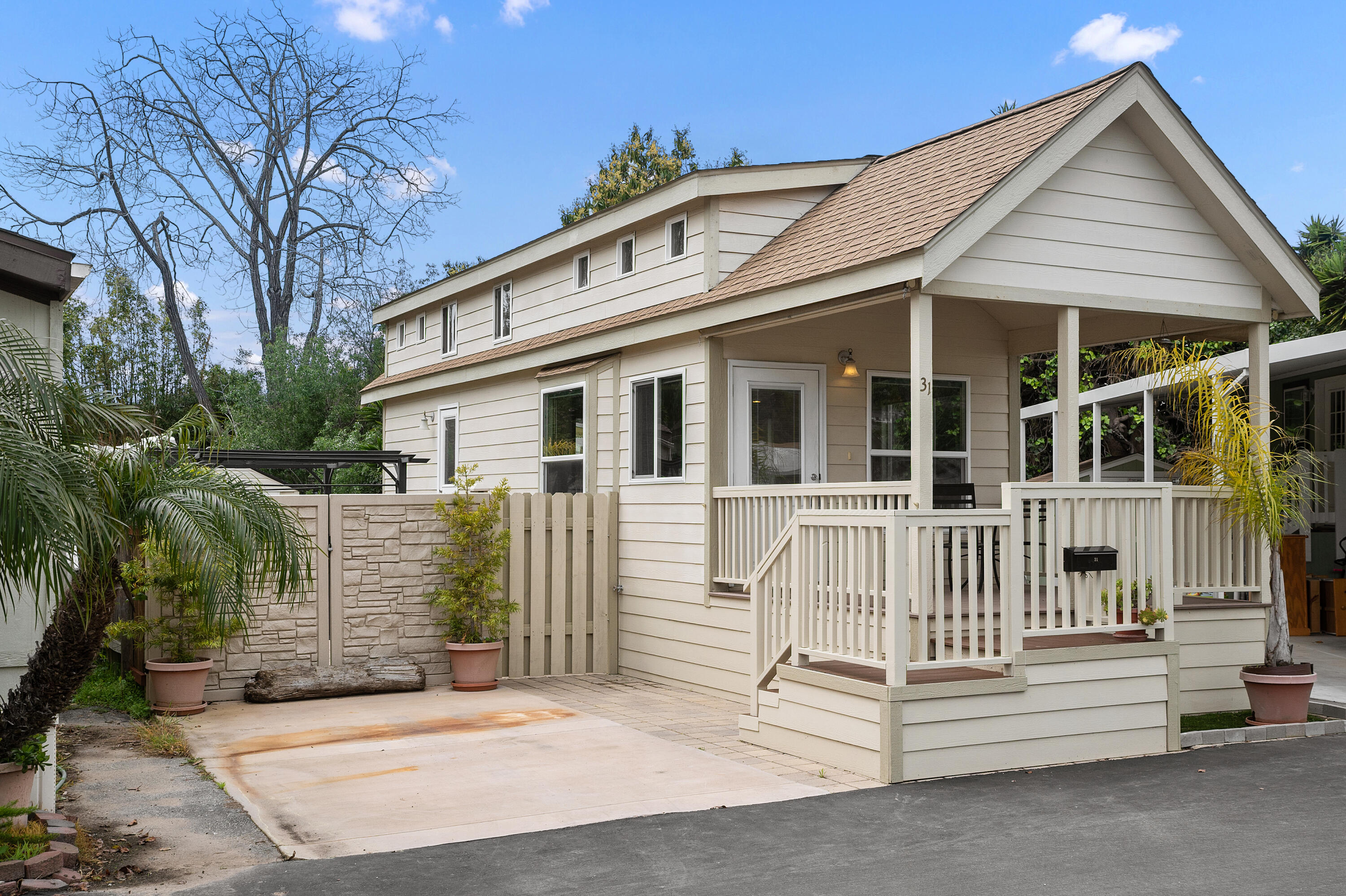 a front view of a house with a porch