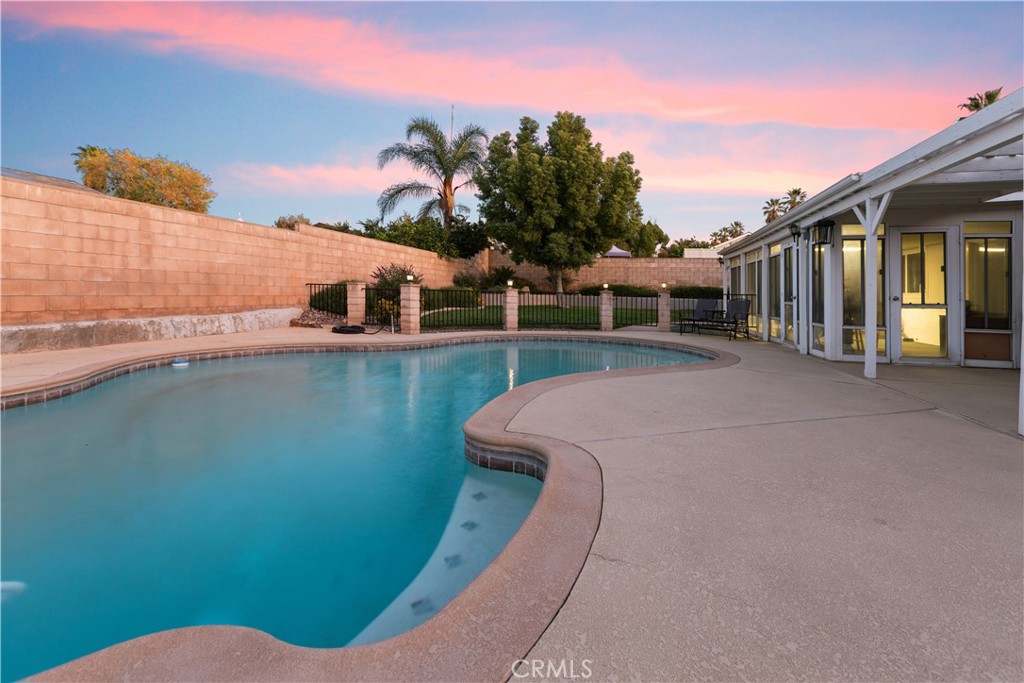 a view of a house with a swimming pool