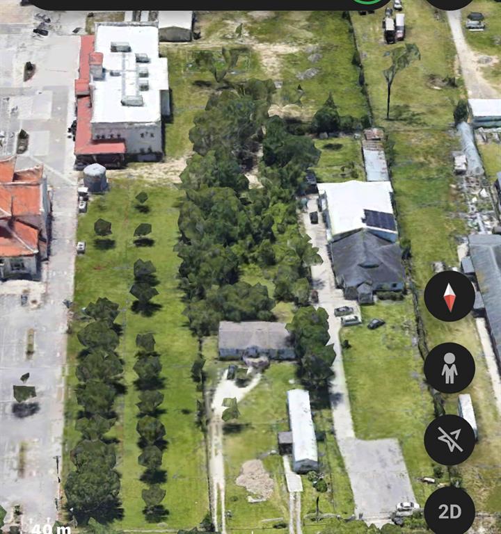 an aerial view of residential house with outdoor space