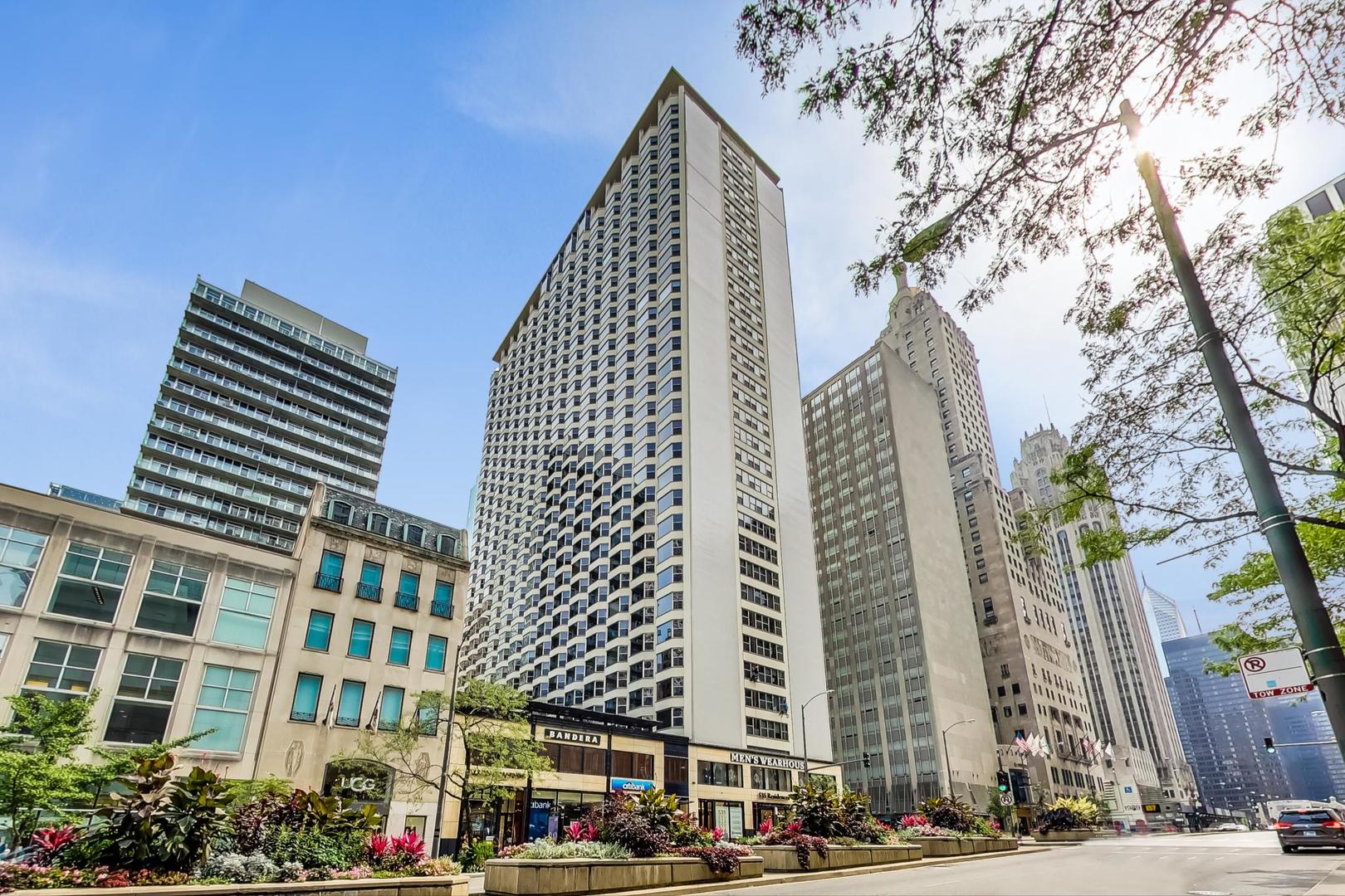 a view of a city and tall buildings