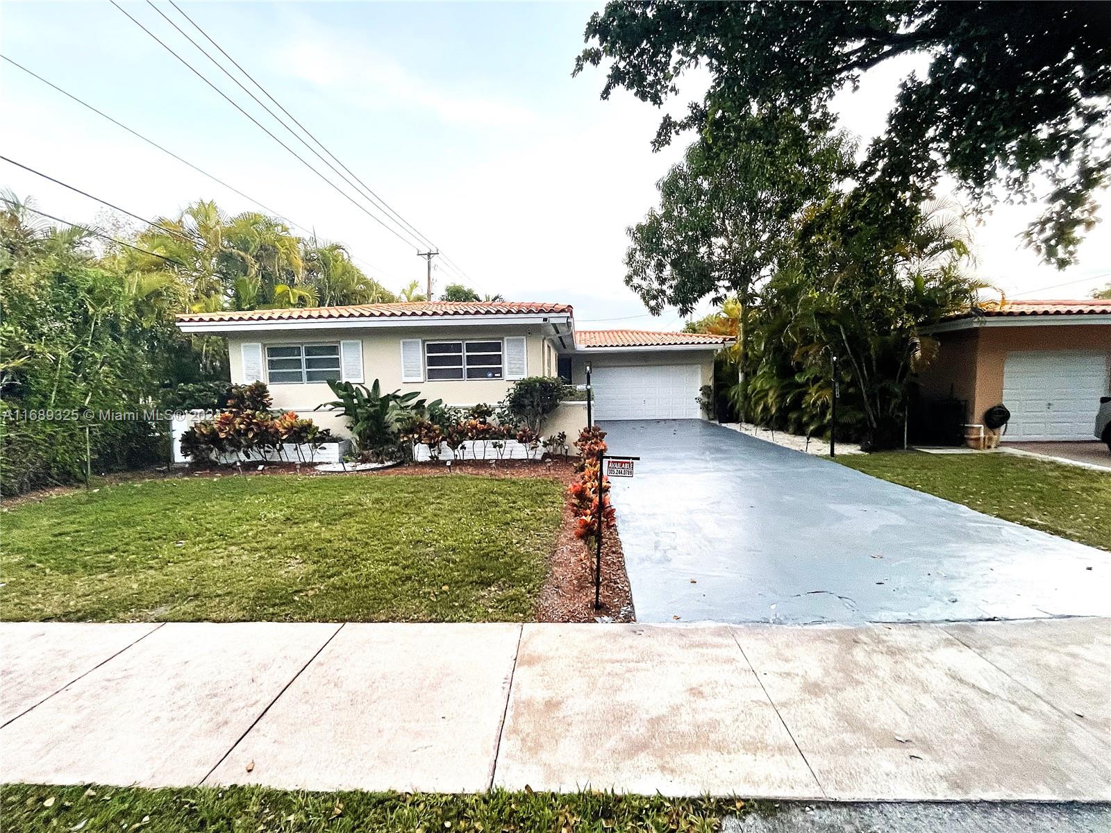 a view front of house with a yard