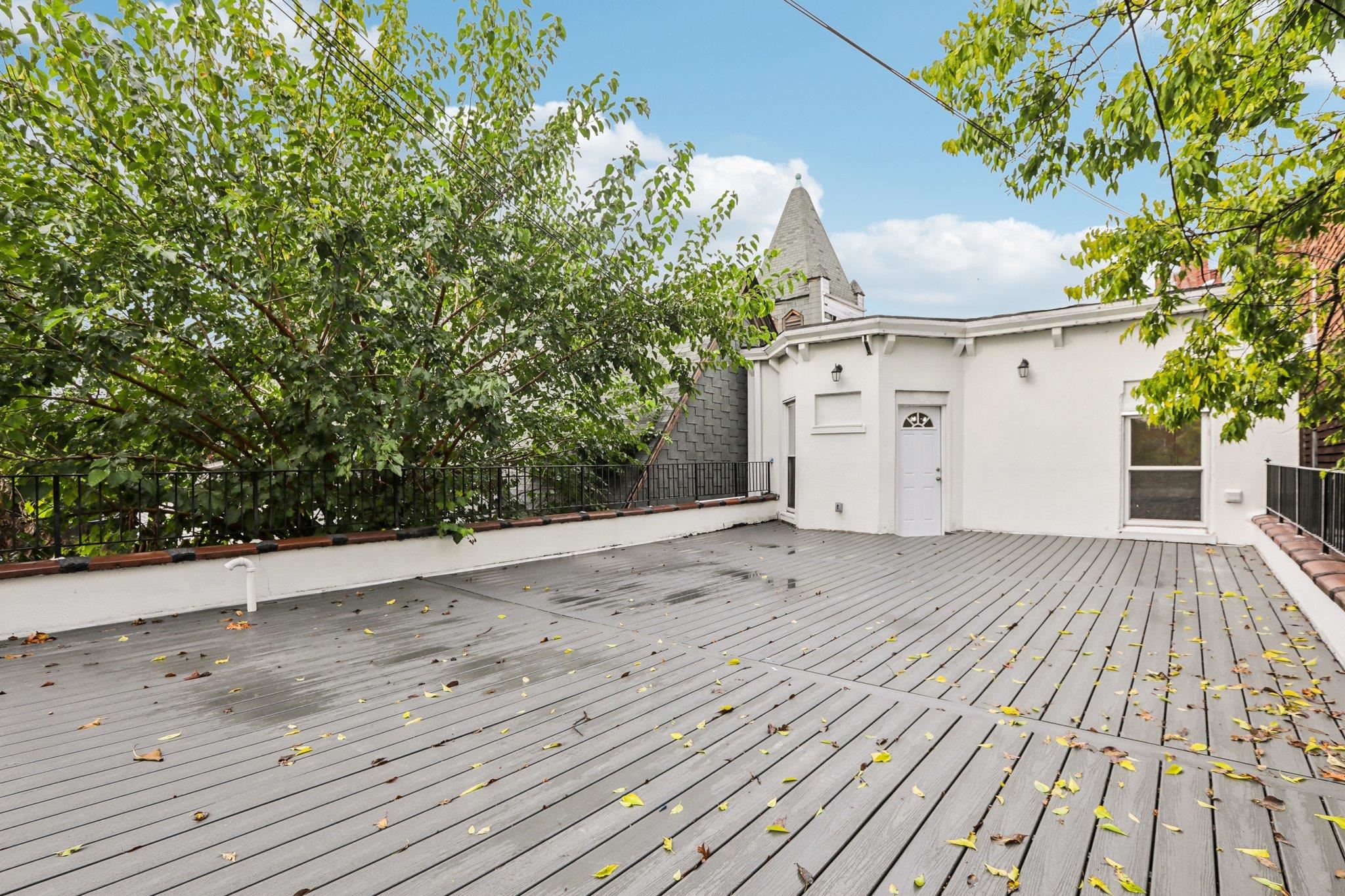 a view of a backyard of the house