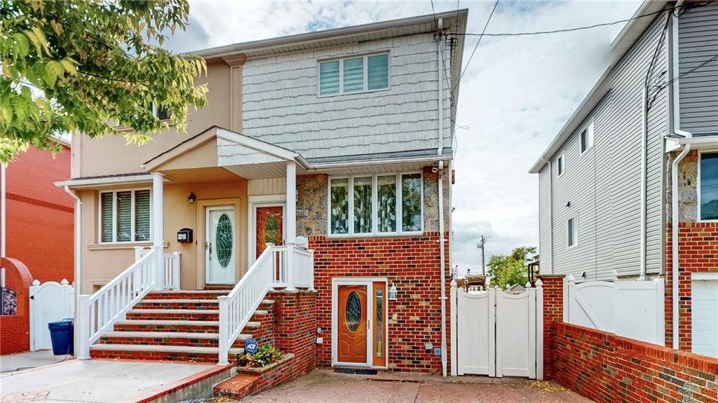 a front view of a house with a porch