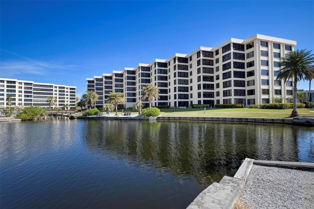 a view of a lake with building in front of house