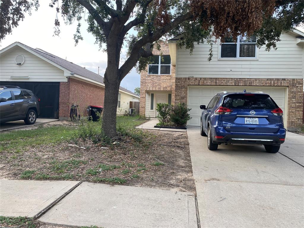 a car parked in front of a house