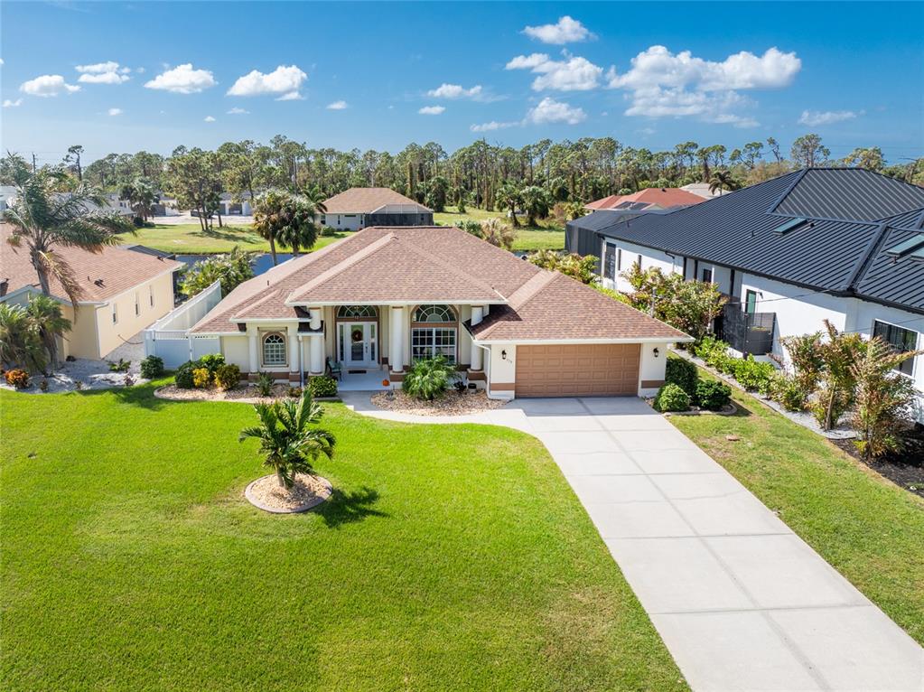 a view of a house with a yard