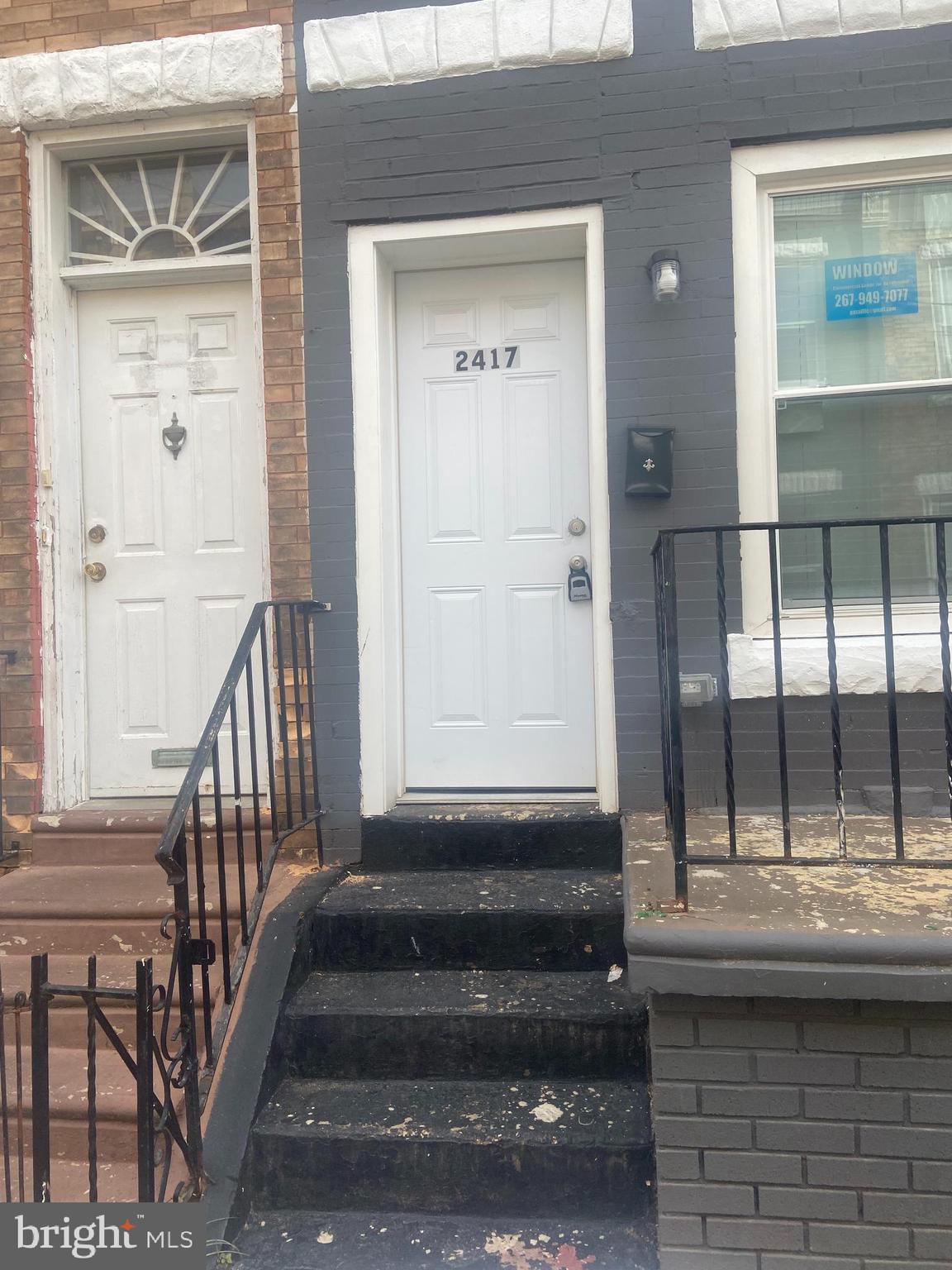 a view of entryway with a front door