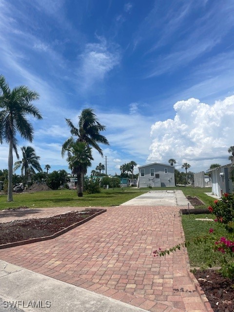 a view of a park and entertaining space