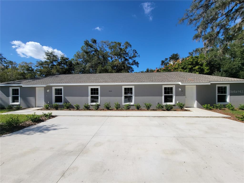 front view of a house with a patio