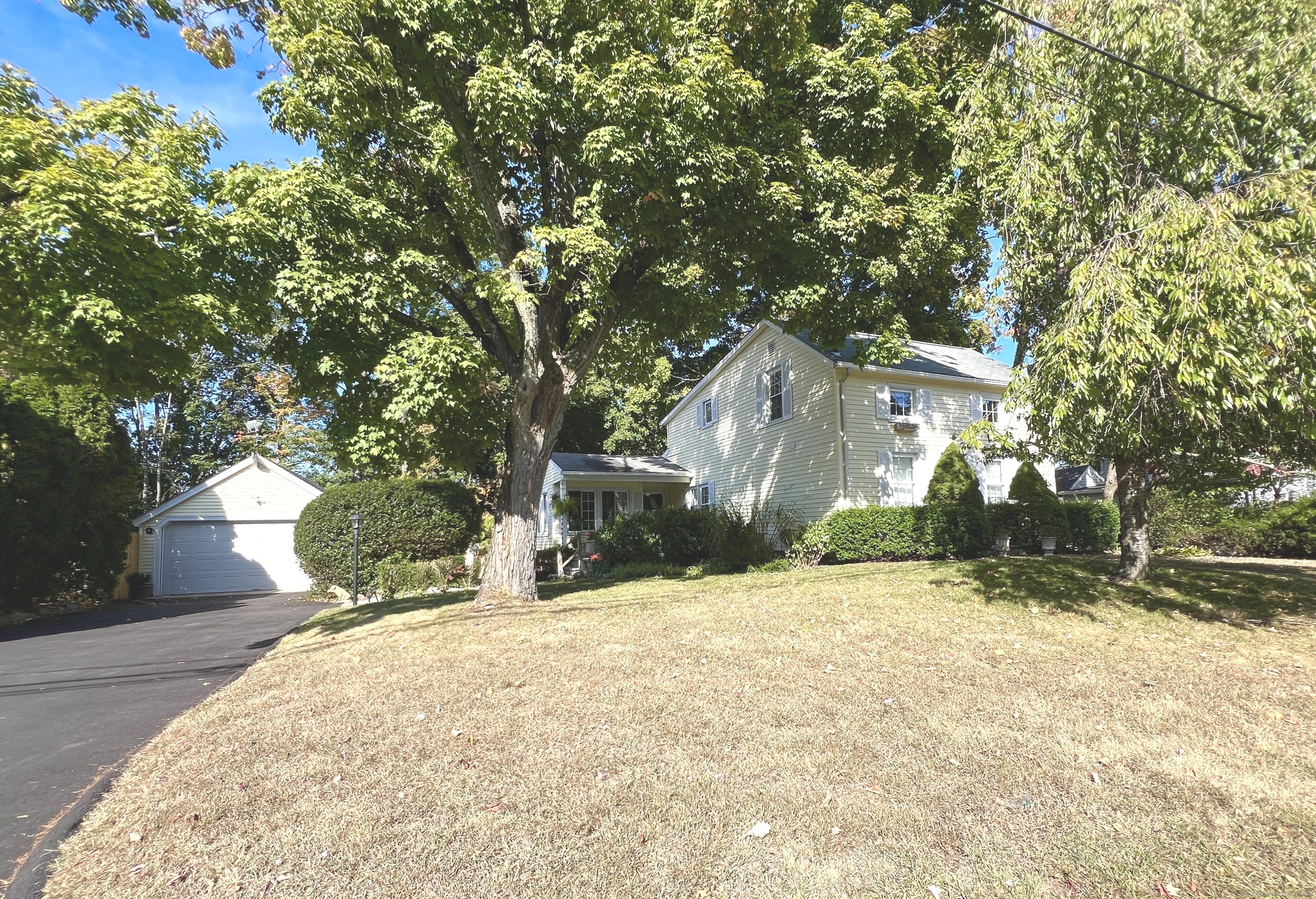 a view of a house with a yard