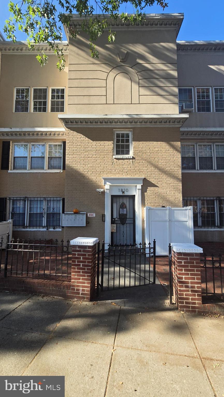 a front view of a house with parking