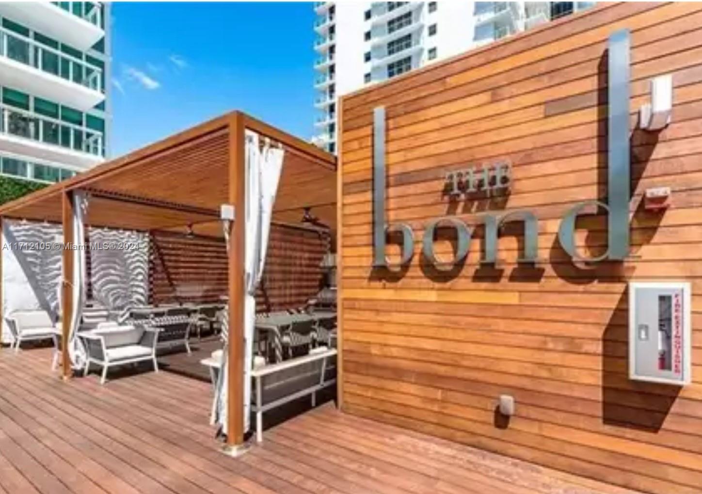 a view of deck with wooden floor and seating space