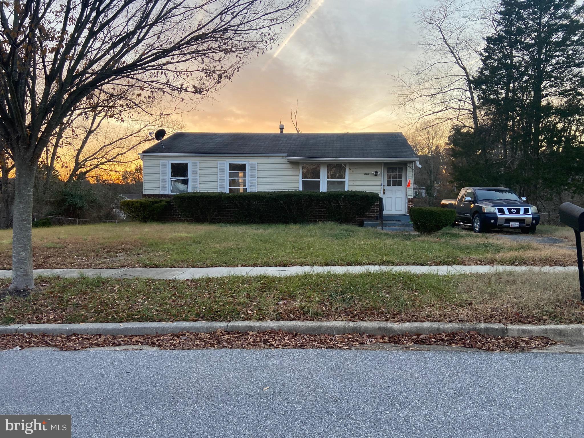 a view of a yard in front of a house