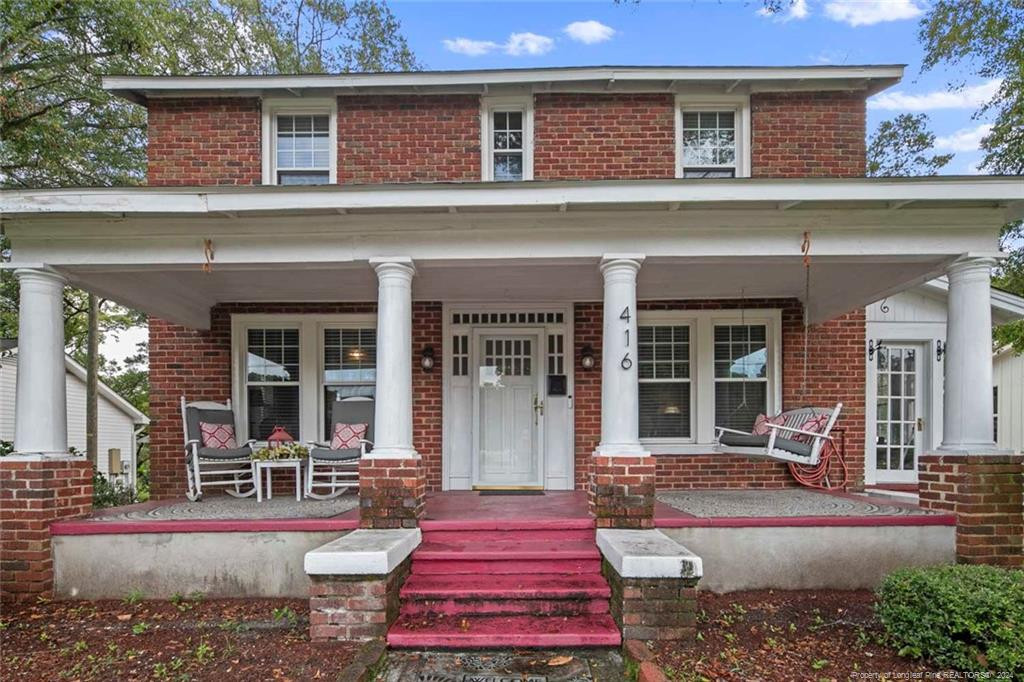 front view of a house with a patio