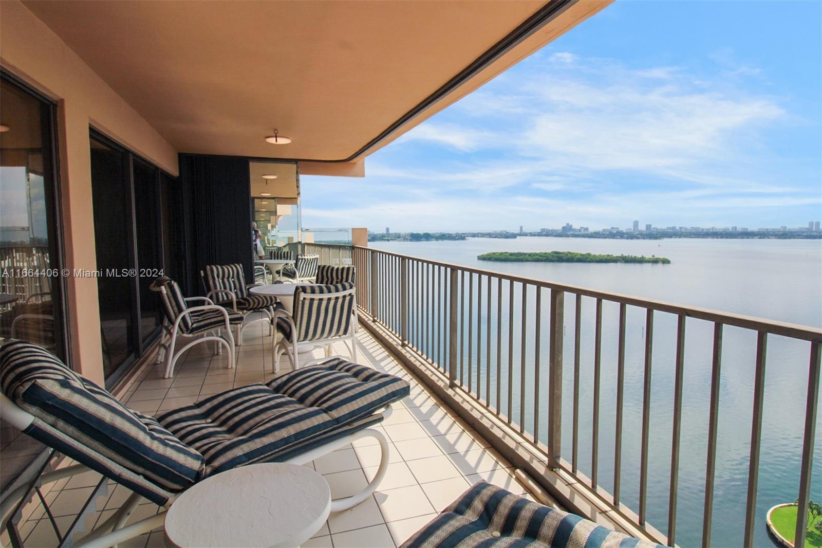 a view of balcony with furniture