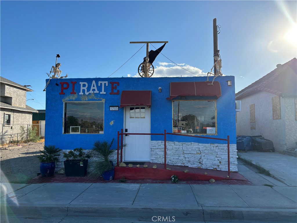 a front view of a house with yard