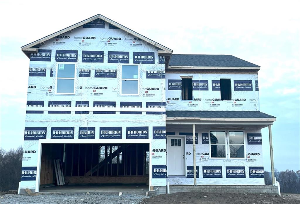 a front view of a house with a balcony