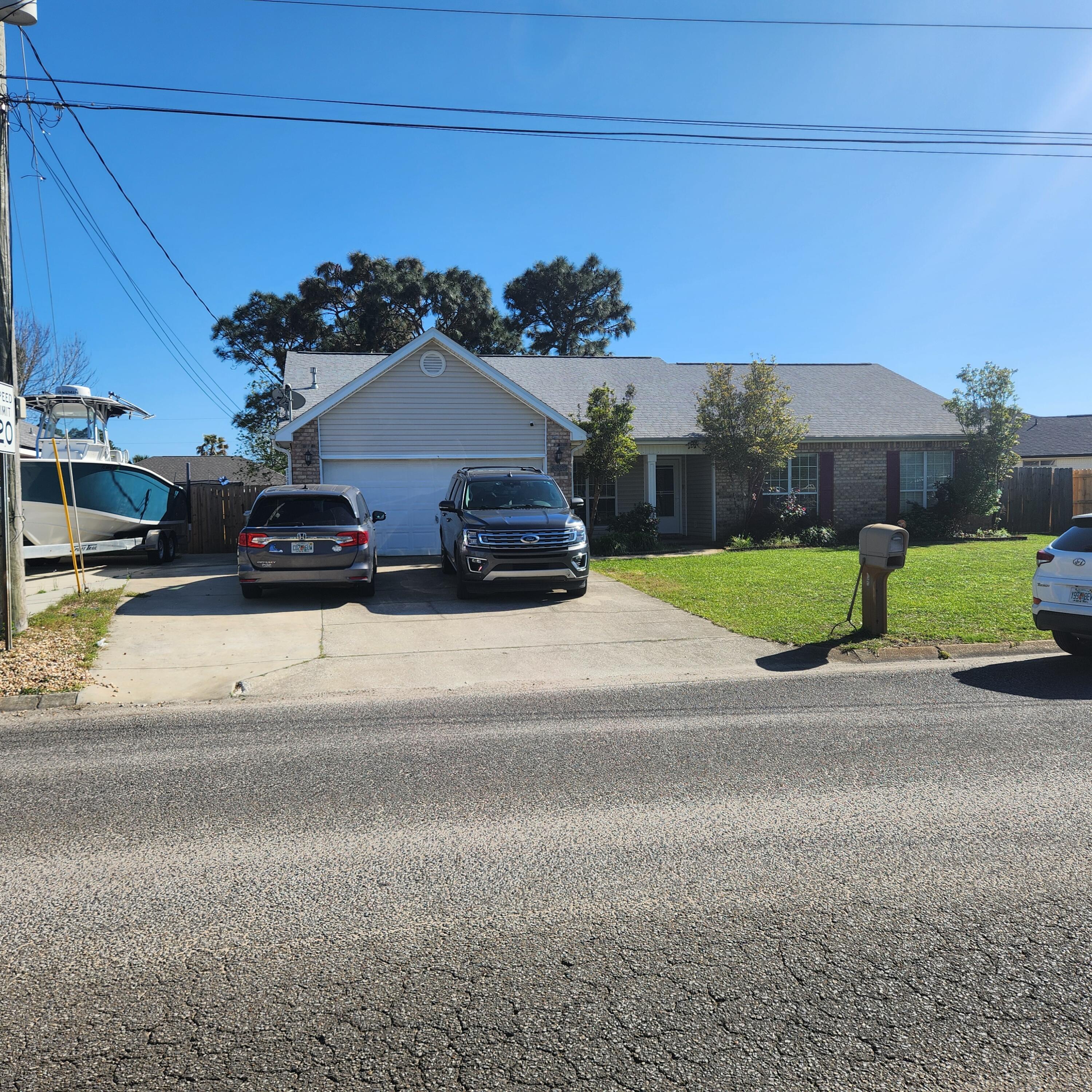 a view of a car parked in front of a building