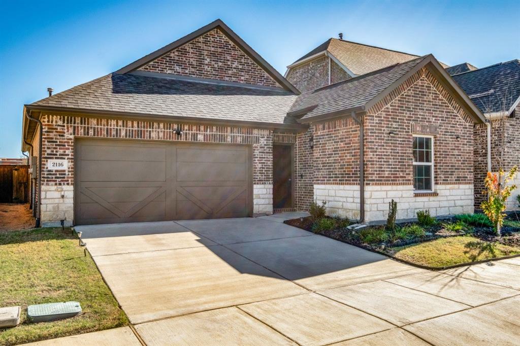 a front view of a house with yard