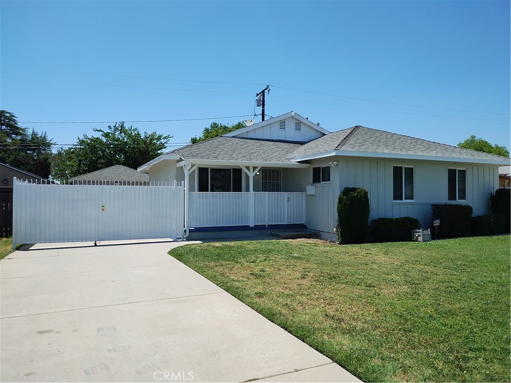 a front view of a house with yard