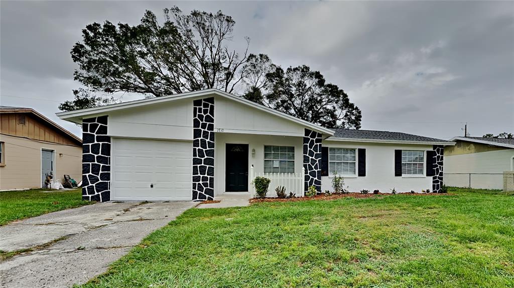 a front view of house with yard