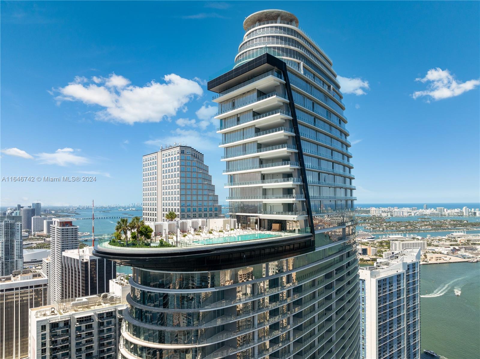 a view of a tall building from a balcony