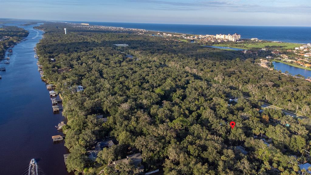 Vacant lot in the stately oaks of the Hammock area of Palm Coast, situated between the Intracoastal and the ocean!