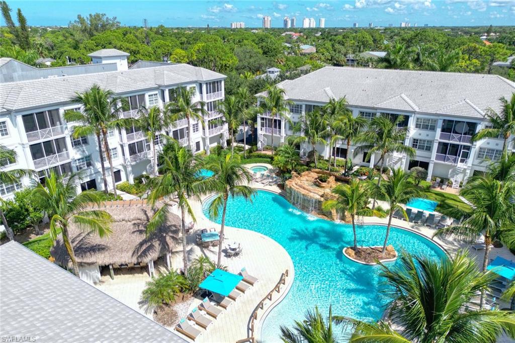 an aerial view of multiple house houses with outdoor space