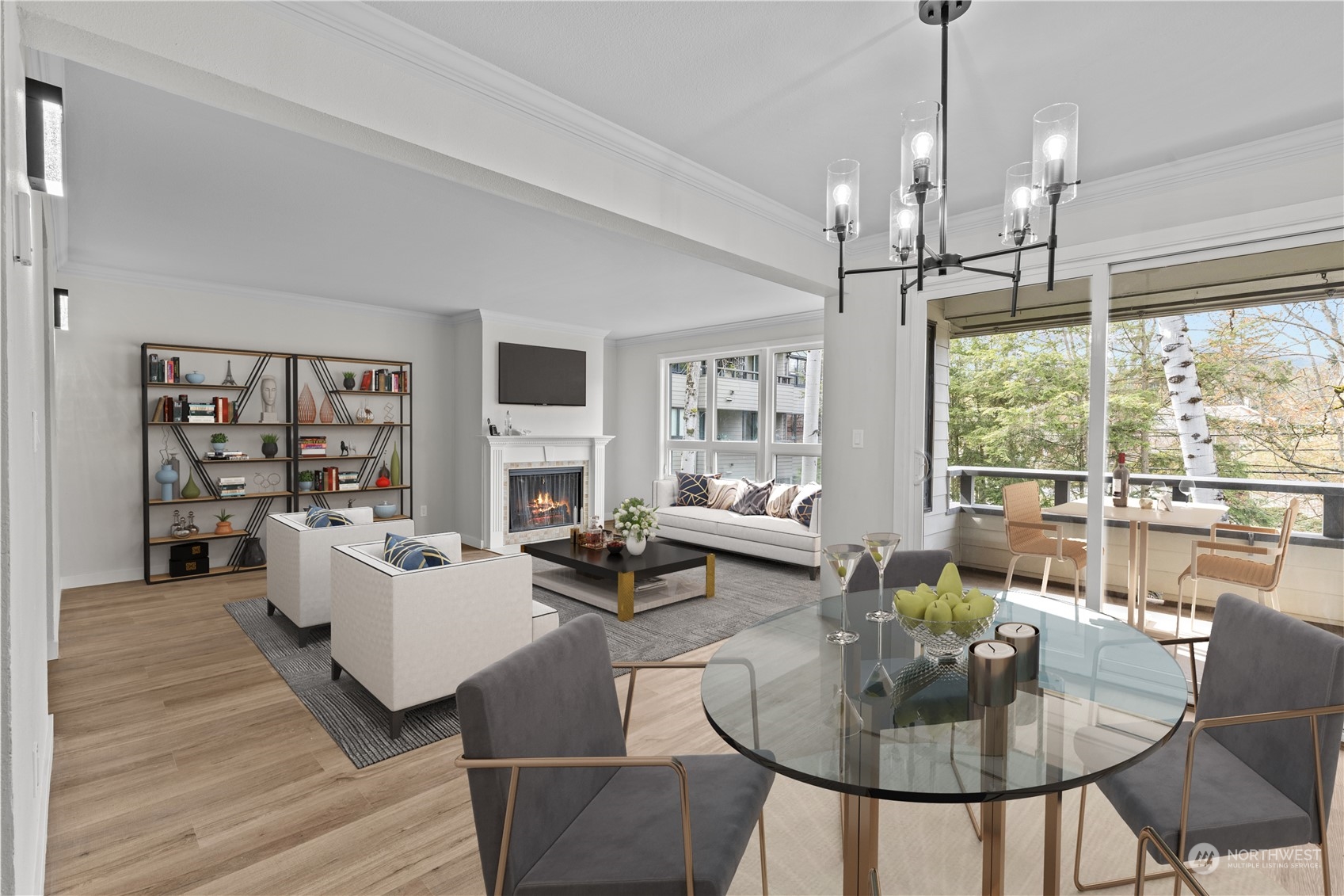 a living room with fireplace furniture and a large window