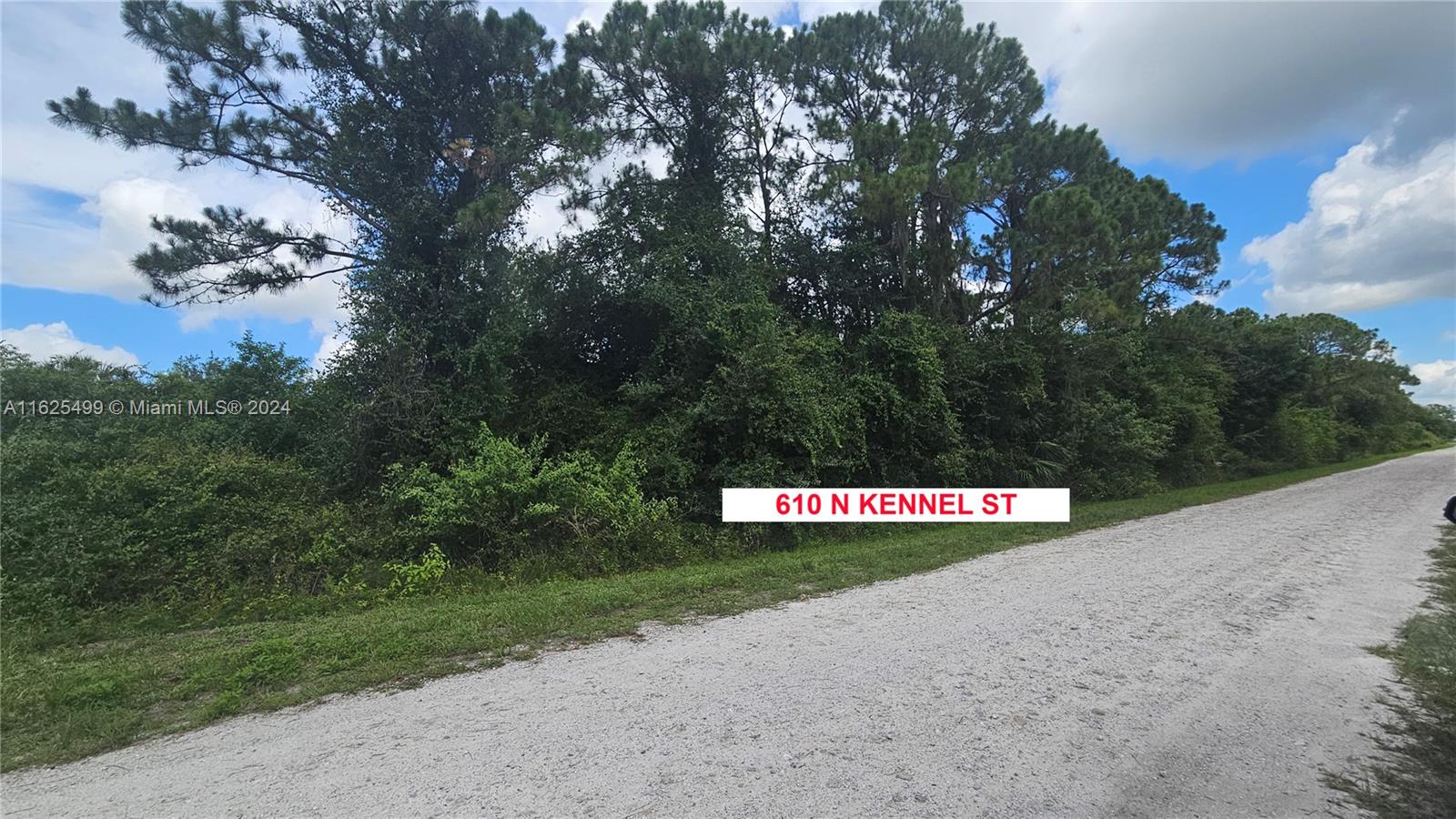 a street sign that is sitting on a road