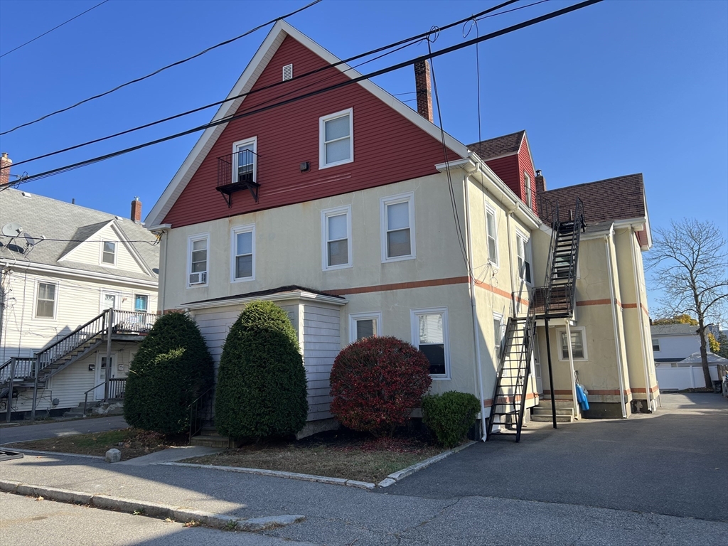 a view of a house with a street