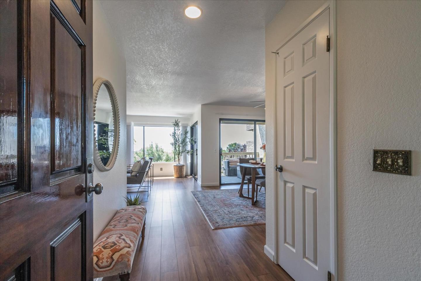 a view of entryway with livingroom and furniture