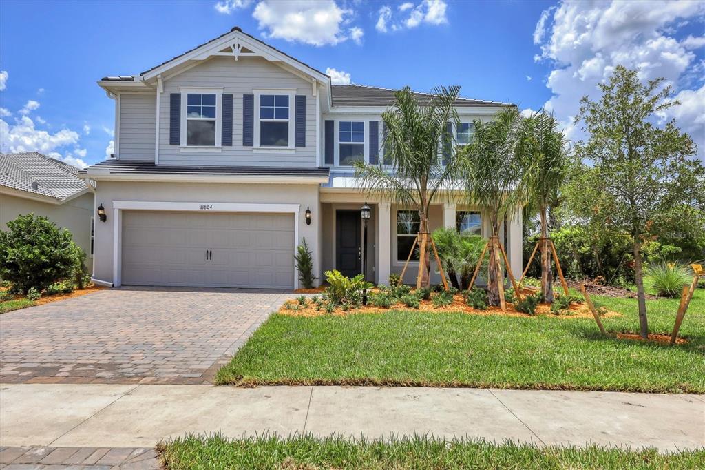 front view of a house with a yard