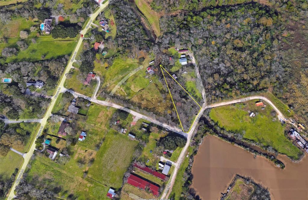 an aerial view of houses with outdoor space