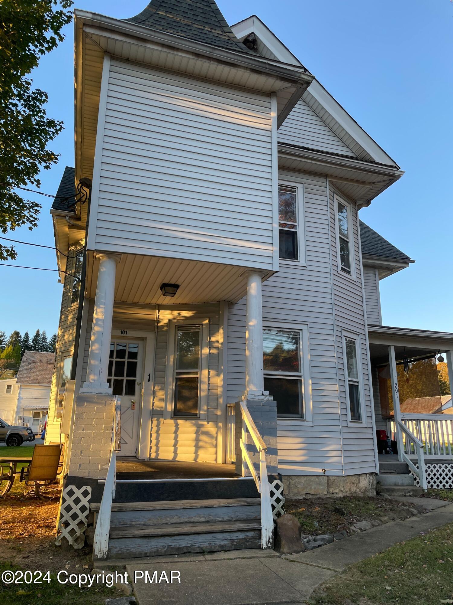 front view of a house with a porch