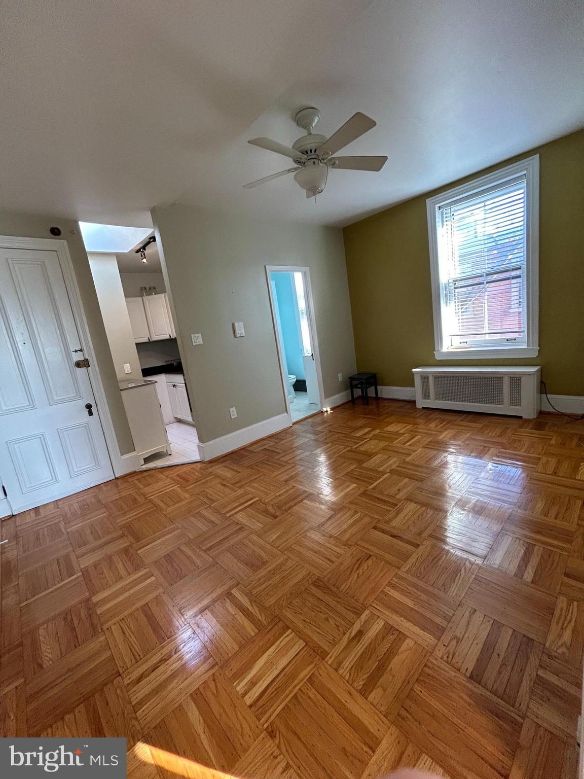 a view of a livingroom with a window